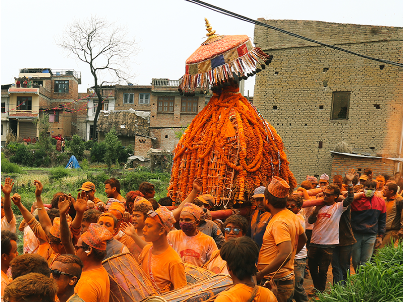 People carrying temple
