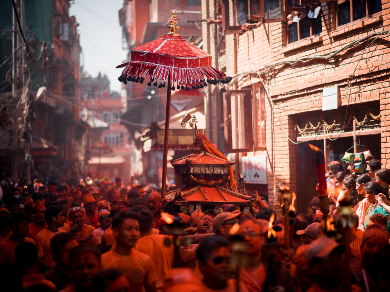 People carrying temple